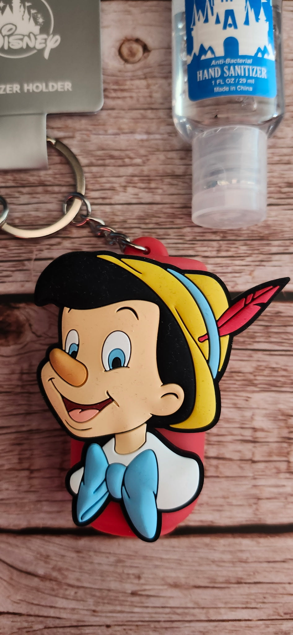 Disney Parks Pinocchio Hand Sanitizer Holder Keychain w/ Sanitizer NWT